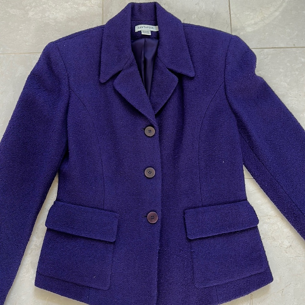 Jacket with flap pockets and buttons in front